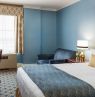 Zimmer mit 1 King Bett, Francis Marion Hotel, Charleston, South Carolina - Credit: Francis Marion Hotel