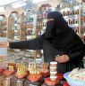 Verkäuferin auf dem Al Husn Souq, Salalah - Credit: AOT